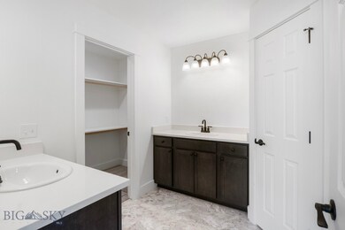 Master bath includes two vanities and a 