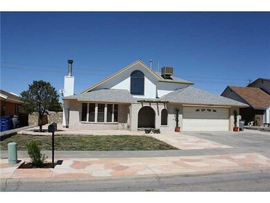 FLAGSTONE AND GRASS IN FRONT OF HOUSE CO