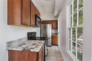 COZY KITCHEN WITH GRANITE COUNTERTOPS AND OVERSIZE