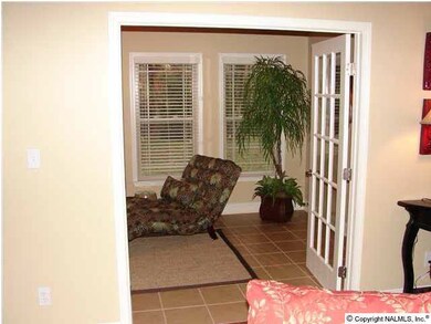 Sunroom with Hardwood floors & french doors