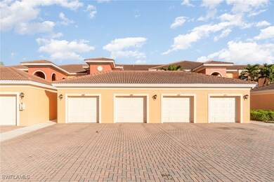 Mediterranean / spanish-style home with a garage