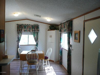 Entry with kitchen on north end