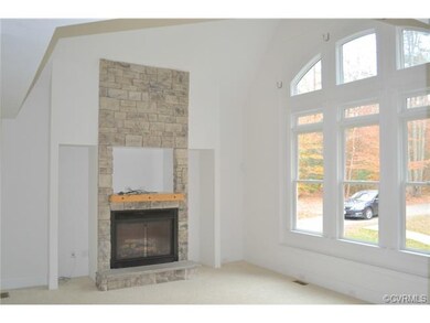 Living room, sunken with 2 story vaulted ceilings 