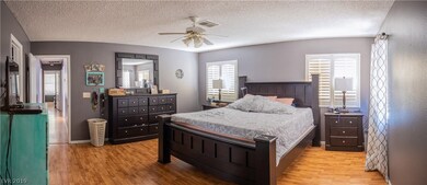 Large Master Bedroom with Shutters and walk in Clo