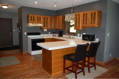 Kitchen has additional seating on the peninsula