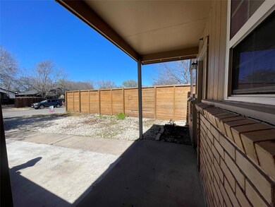View of patio with fence