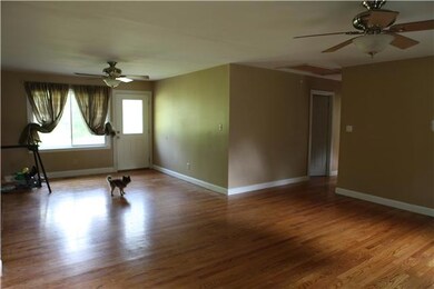 Large open living room/den open to eat in kitchen/dining area.  Beautiful hardwood floors and again, neutral paint colors (recently repainted) - move in ready!