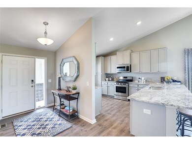 An amazing space with vaulted ceilings welcomes yo
