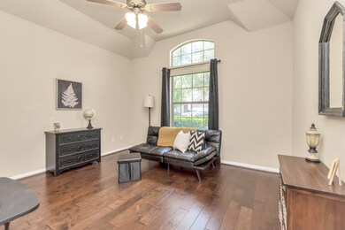 Bedroom 2 with upgraded wood flooring and Ensuite