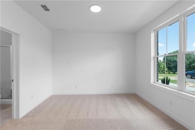 Bedroom with full bathroom on terrace level