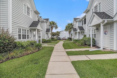 View of home's community featuring a yard and a residential view