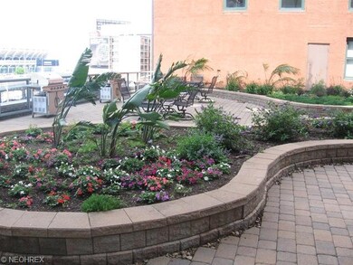 Courtyard with beautiful gardens & grills for your