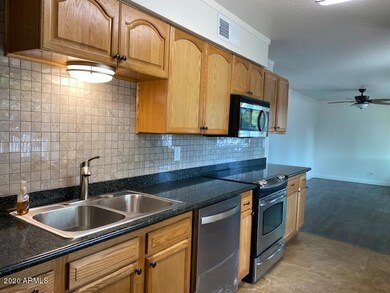 7138 E Bell Cir, Mesa, AZ 85208 - photo 4