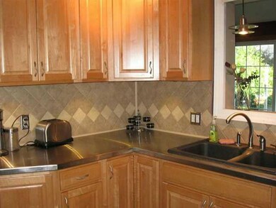 Kitchen. The kitchen has gorgeous maple cabinetry 