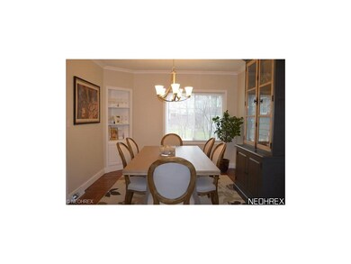 Formal dining room with refinished wood floors, co