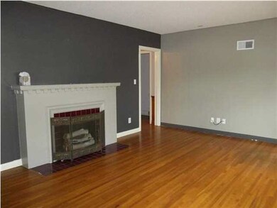 Formal Living rm w/ decorative fireplace