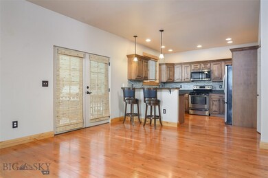 Bright dining and kitchen space with bar seating