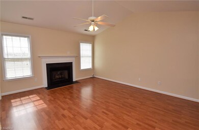 Open living room with vaulted ceiling!