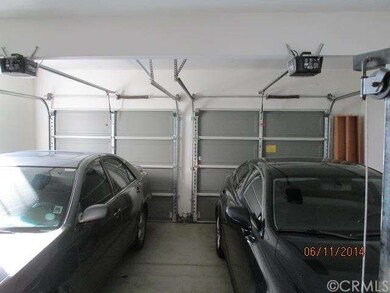 Two car garage with double openers.