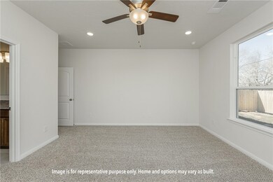 Unfurnished bedroom with light carpet, recessed lighting, ceiling fan, and connected bathroom