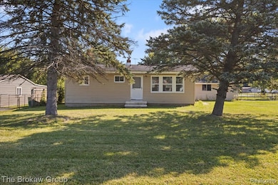View of front of property with a chimney