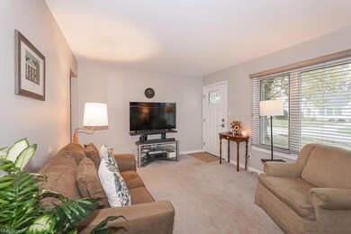 Living room with light carpet
