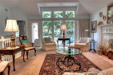 Beautiful floor to ceiling windows backing to priv