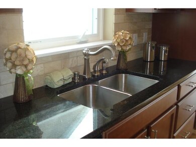 Stainless steel undermount sink.