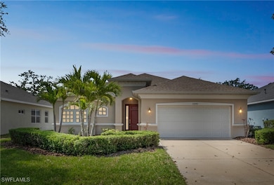 View of front of property featuring concrete drive