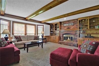 Cozy up to the red brick fireplace.