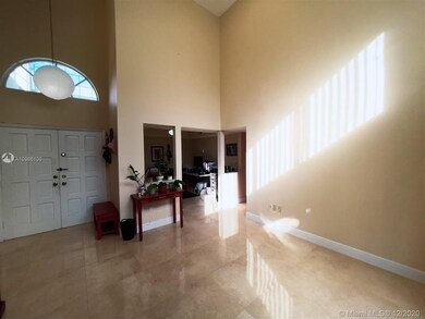 Living room with high ceilings... lot of light her