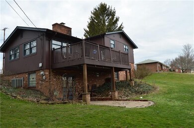 Composite deck off the kitchen.  Access to yard fr