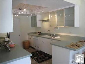 View 2 of kitchen including breakfast bar that is 
