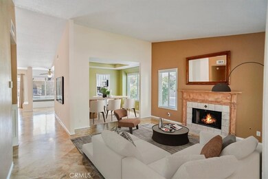Living room and dining room are virtually staged.