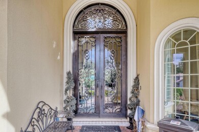 Property entrance featuring french doors