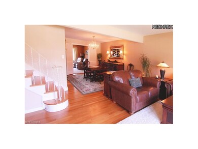 View of living, dining and family room shows ease 