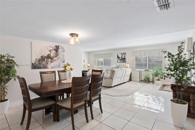 Kitchen, living and dining are open to one another.