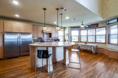 Kitchen featuring with side by side fridge and fre