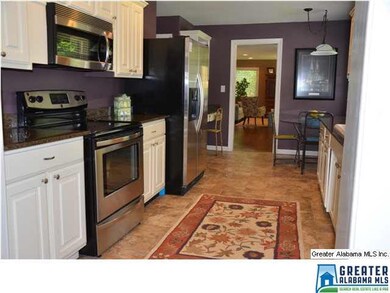 UPDATED Kitchen with granite counter tops, tile fl