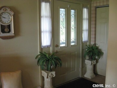 Foyer. Entry from the private side porch.