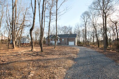 Beautiful Wooded Lot with extra-long Driveway!