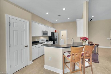 5569 Whispering Willow Way, Fort Myers, FL 33908 - photo 4