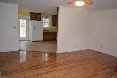 Large Family Room with beautiful laminate flooring