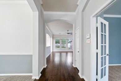 Entering the house you are greeted with the home office immediately to your right and the formal dining room to your left.
