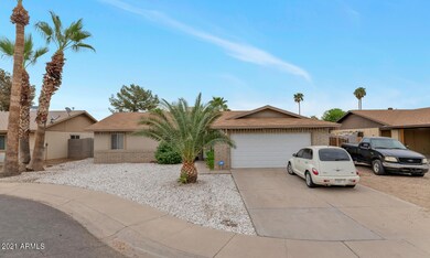 3067 N 89th Ln-large-001-009-3067 N 89th