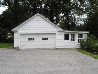 DETACHED TWO CAR GARAGE WITH ADDITIONAL STORAGE RO