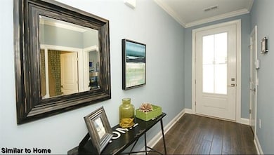 *All following photos are not exact but similar* 9' Ceilings to a very elegant entry to a well-appointed home.  Secondary Bedrooms off front entry hall-Bedroom 2