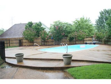 Relax in the beautifully landscaped, fenced backya
