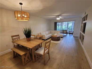 Dining space featuring visible vents, light wood-s