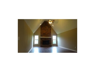 HUGE family room with vaulted ceiling and soaring 